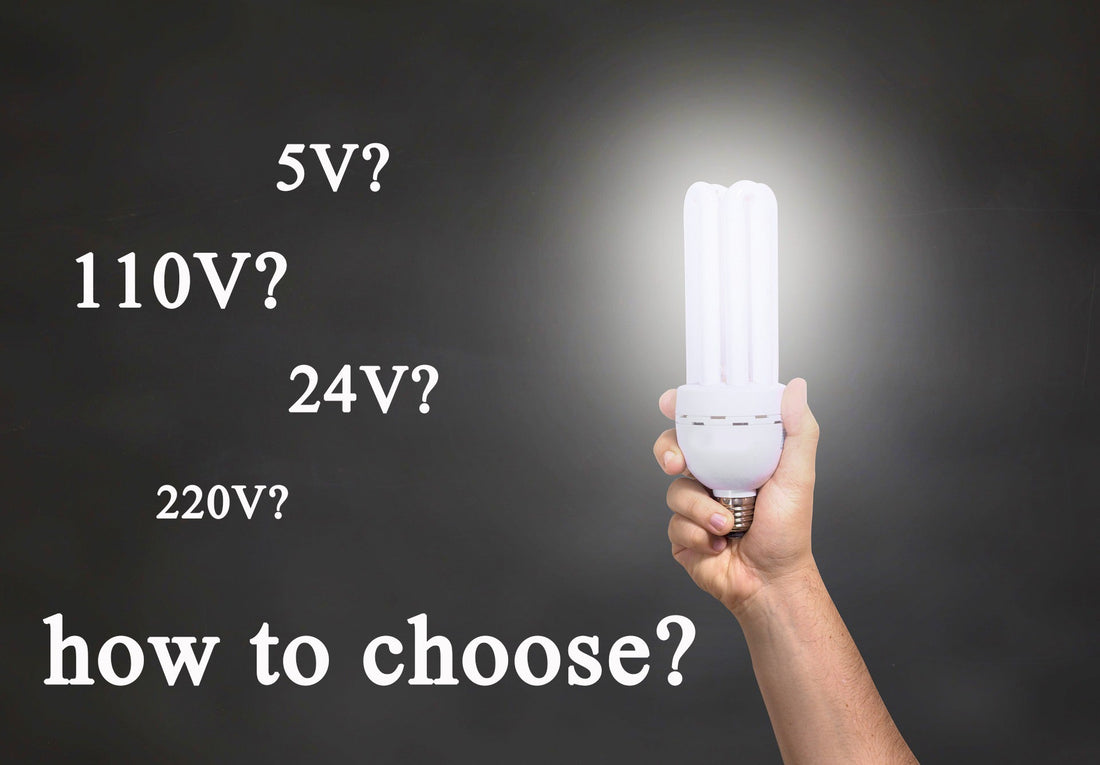 Hand holding glowing LED bulb with voltage options and text how to select voltage for LED bulbs