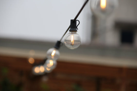 Close up of glowing outdoor LED string lights highlighting outdoor LED string lights benefits