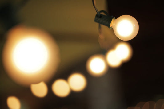 Close-up of warm glowing LED light bulbs in a row illustrating LED light strip solutions