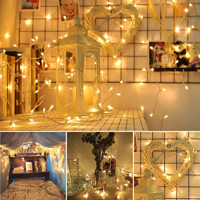 Warm white Battery String Lights by Ningbo Foroureyes Electric Co., Ltd. decorating a cozy room and wooden lantern