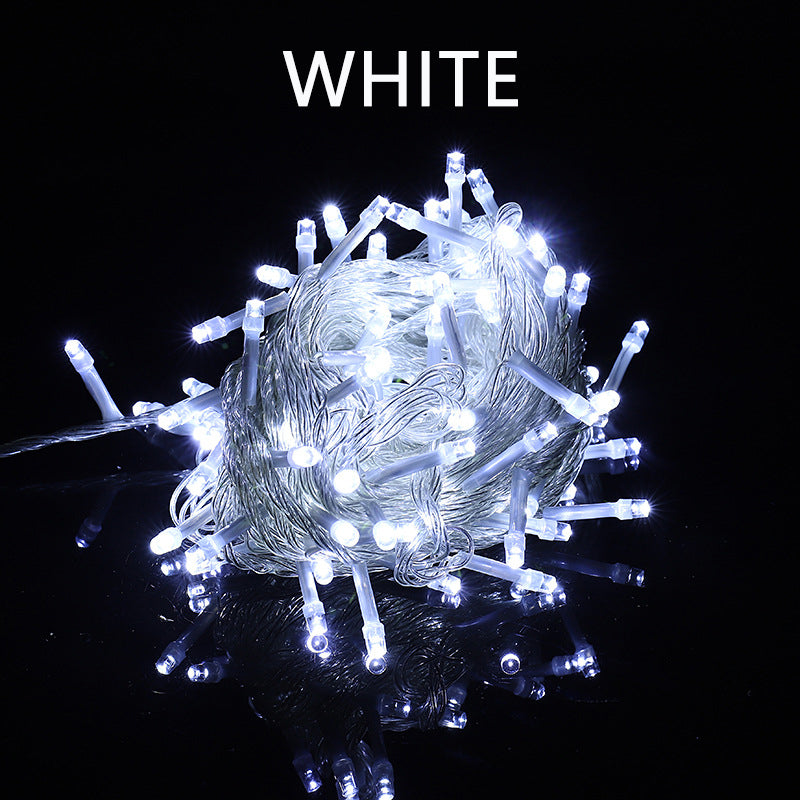 White LED Christmas Lights bundle glowing brightly on a dark background by Ningbo Fuaisi Electric Appliance Co