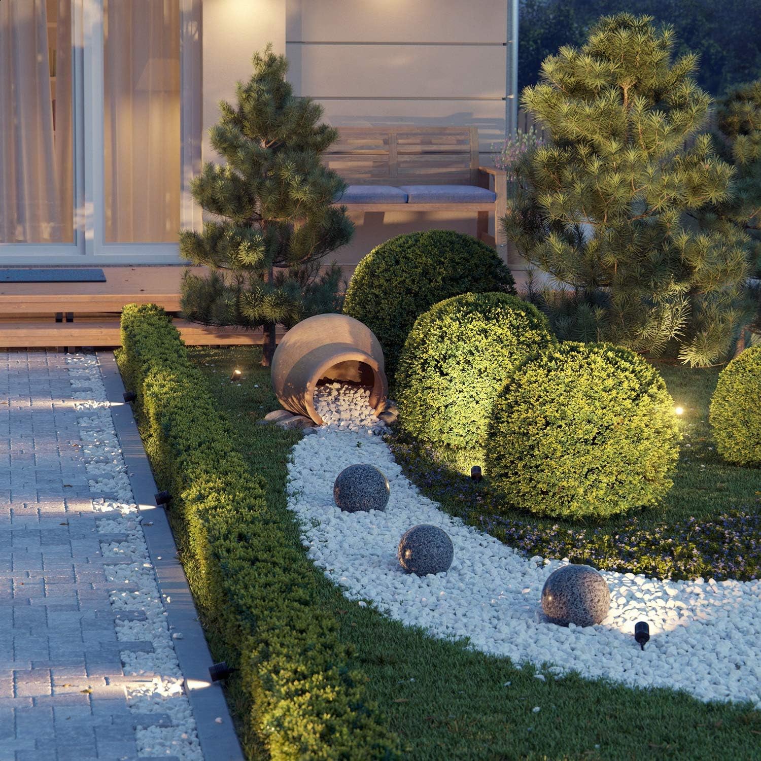 led garden spotlights illuminating decorative landscaping with bushes and stone path at night