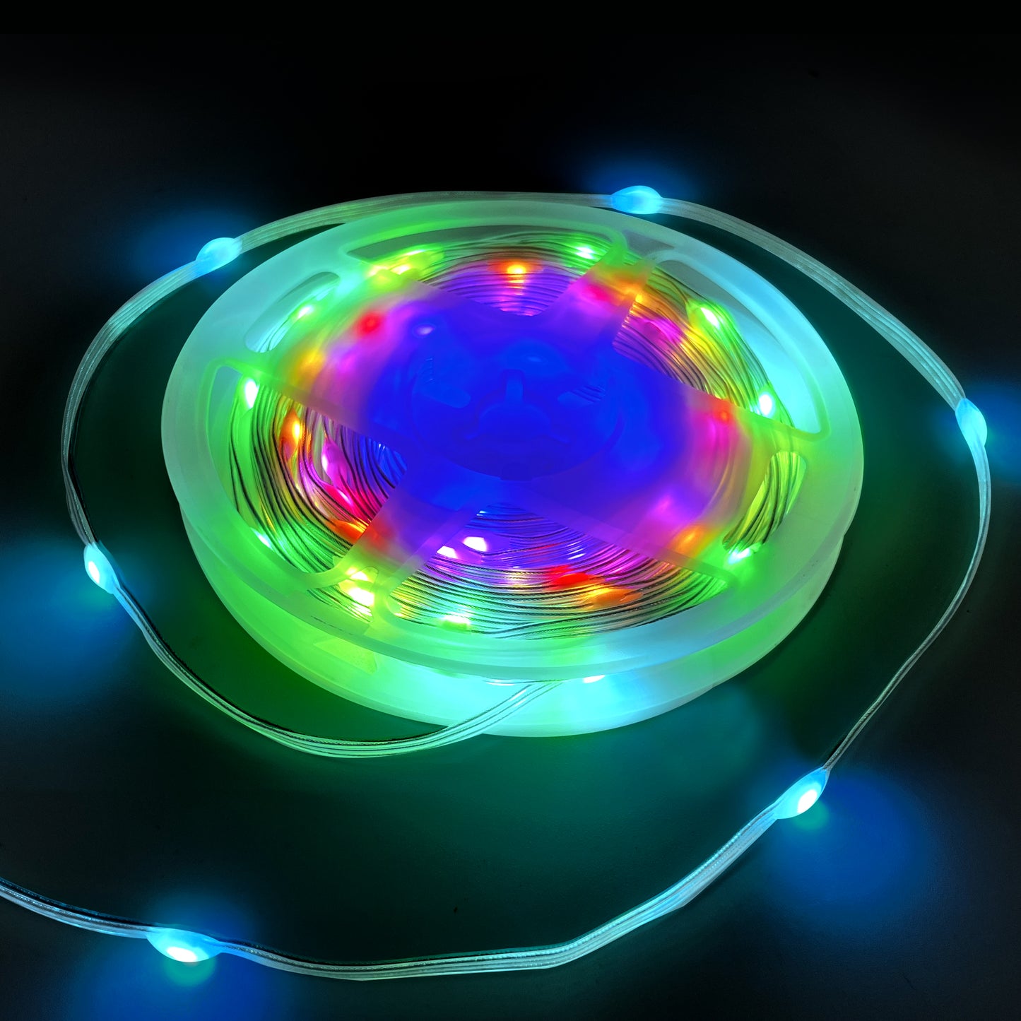 Colorful LED String Lights on a spool, perfect for outdoor decorations and lighting