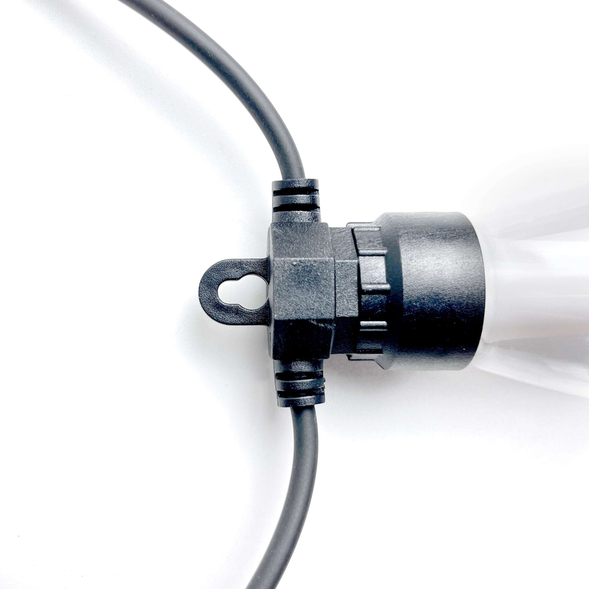 Close-up of black connector and cable part of outdoor fairy lights by Ningbo Fuaisi Electric Appliance
