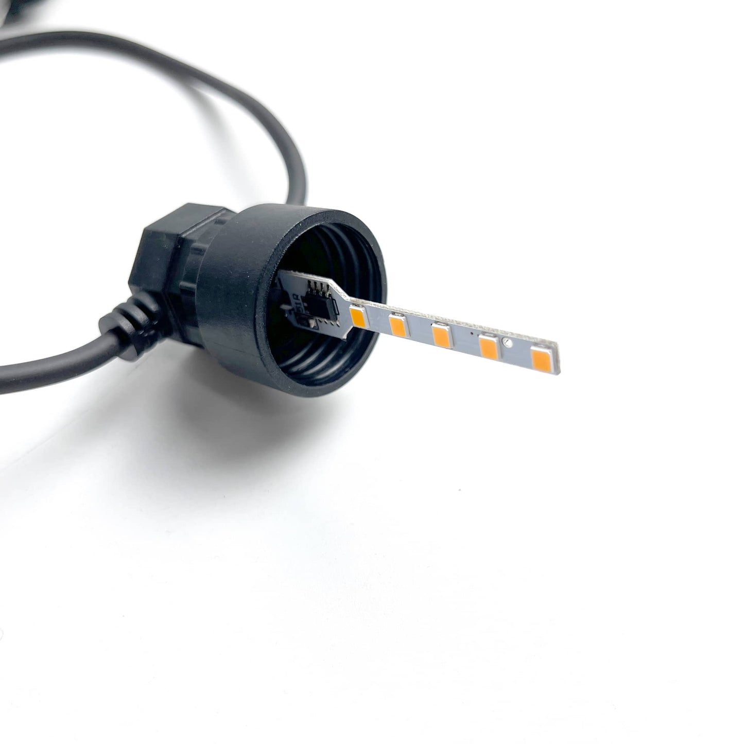 Close-up of Ningbo Fuaisi fairy lights outdoor lighting LED strip and black cable connector