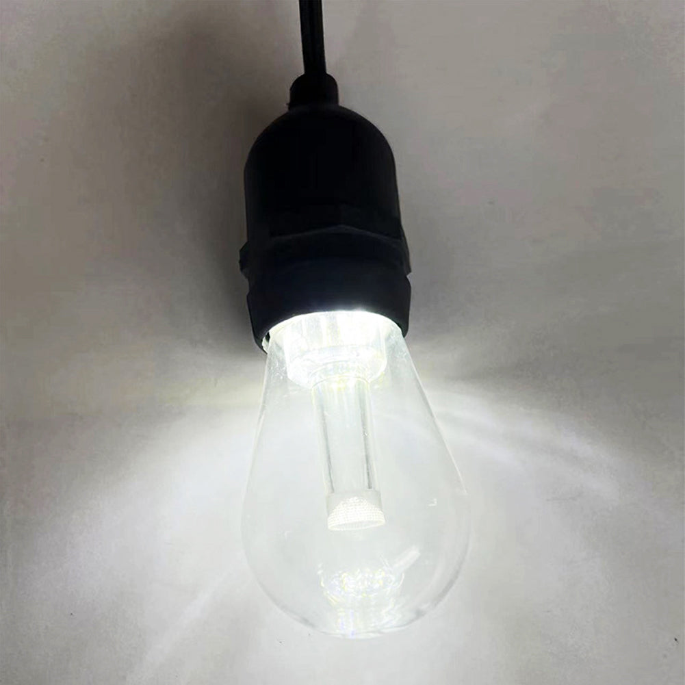 Single clear bulb smart outdoor string lights hanging with black socket emitting bright white light