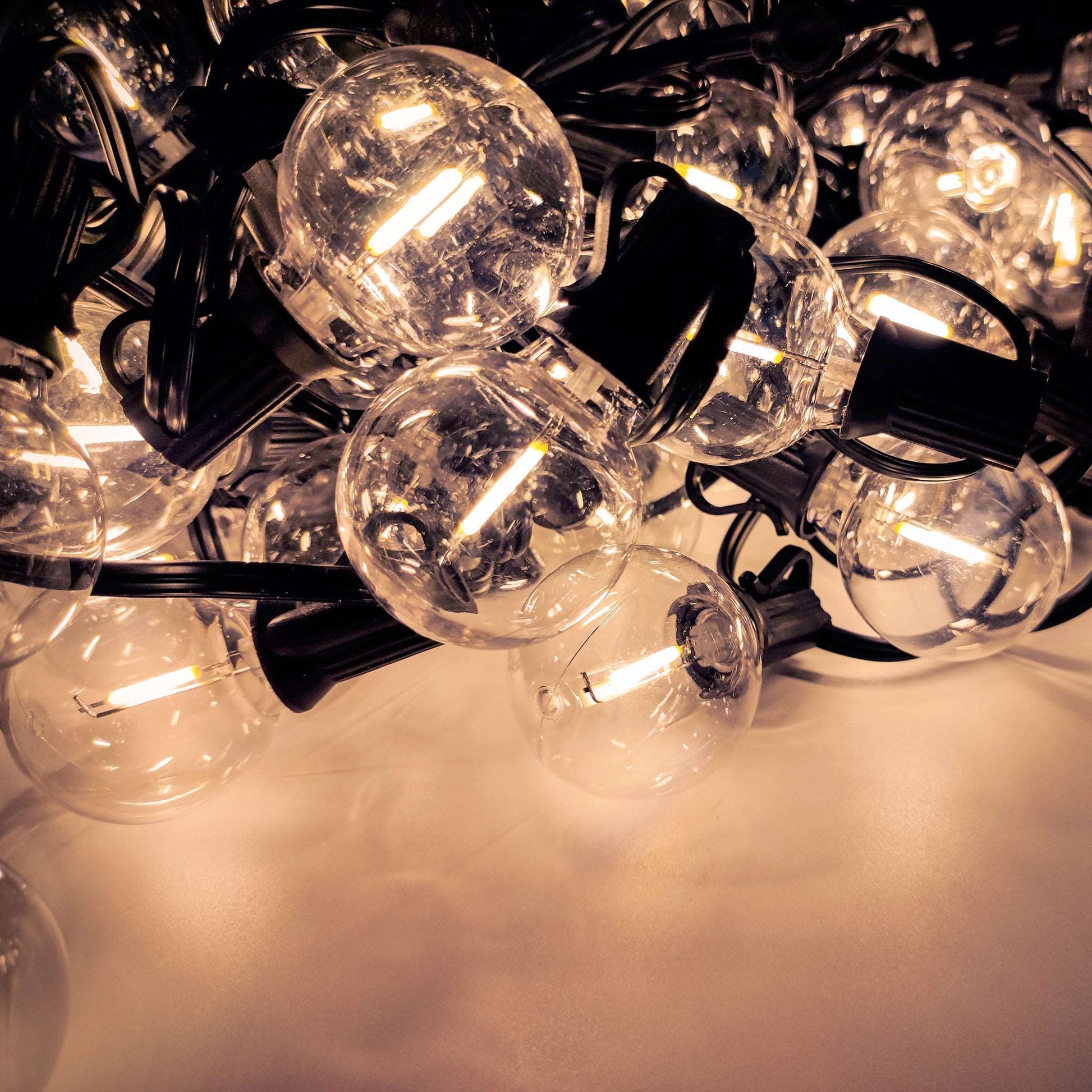 Ningbo Fuaisi Electric Appliance Co solar led outdoor lighting with clear globe bulbs glowing warmly