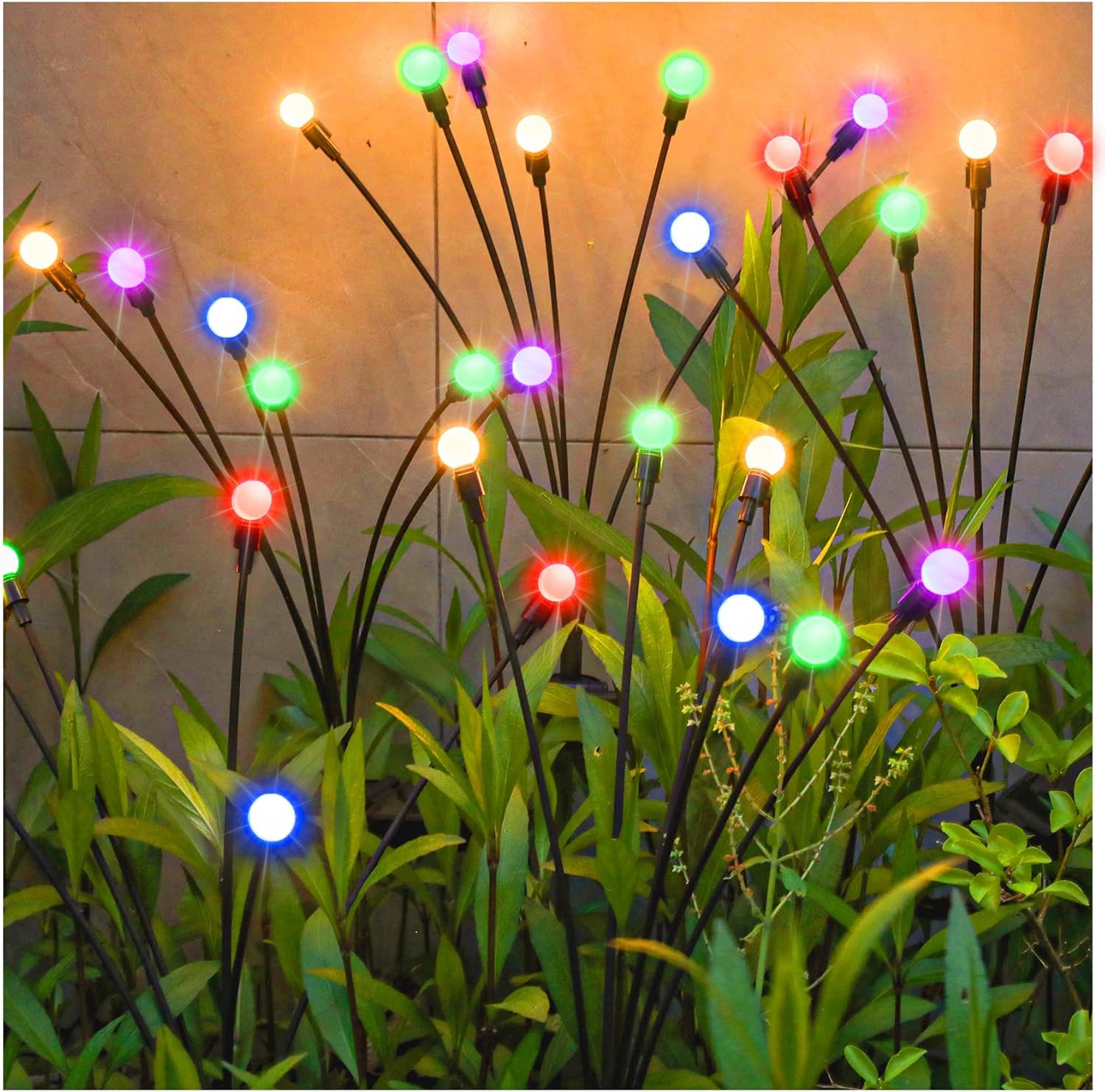 Colorful Solar Lights lawn lamp with multiple glowing bulbs on black stems among green plants