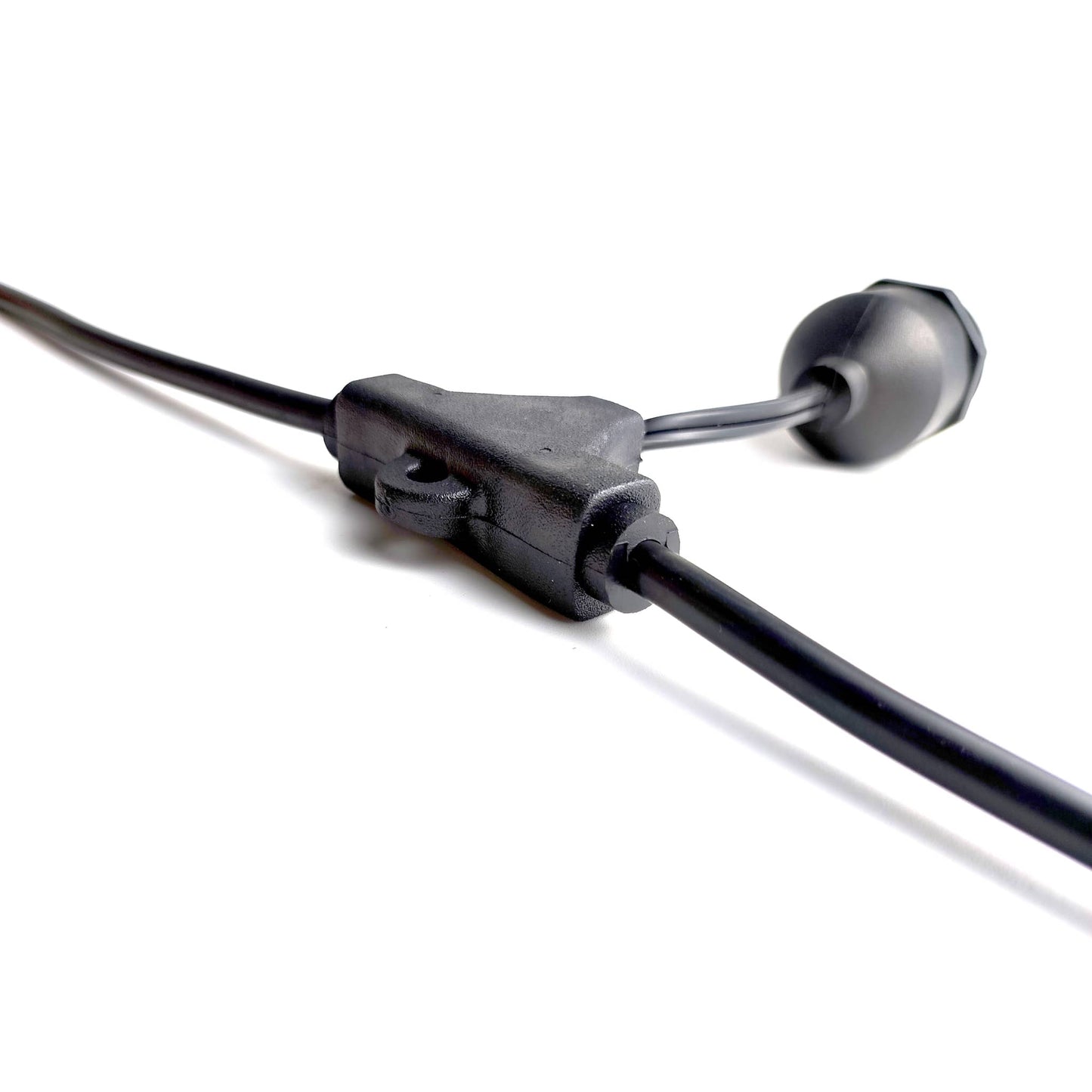 Close-up of Ningbo Fuaisi Electric Appliance Solar String Lights black connector and wiring for outdoor lighting