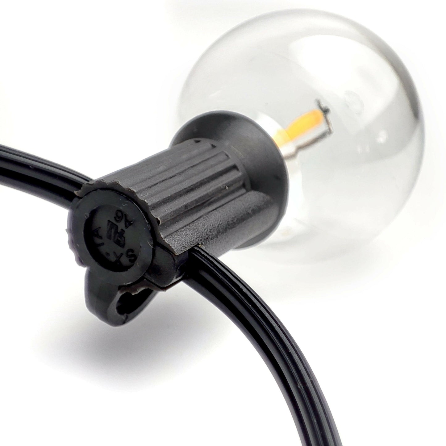 Outdoor solar lights with clear bulb and black cable for decorative garden and patio lighting