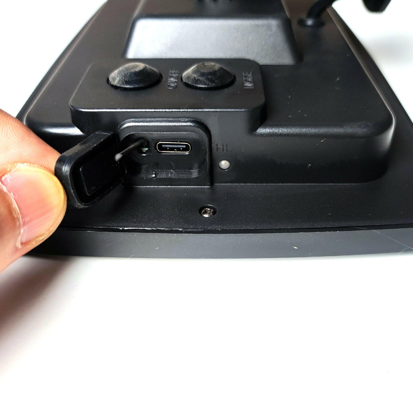Close-up of charging port and control buttons on black outdoor solar lights by Ningbo Fuaisi Electric Appliance