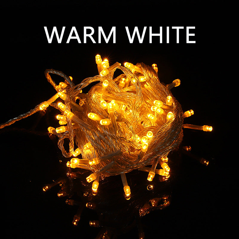 Warm white LED Christmas Lights in a decorative bundle for festive outdoor lighting