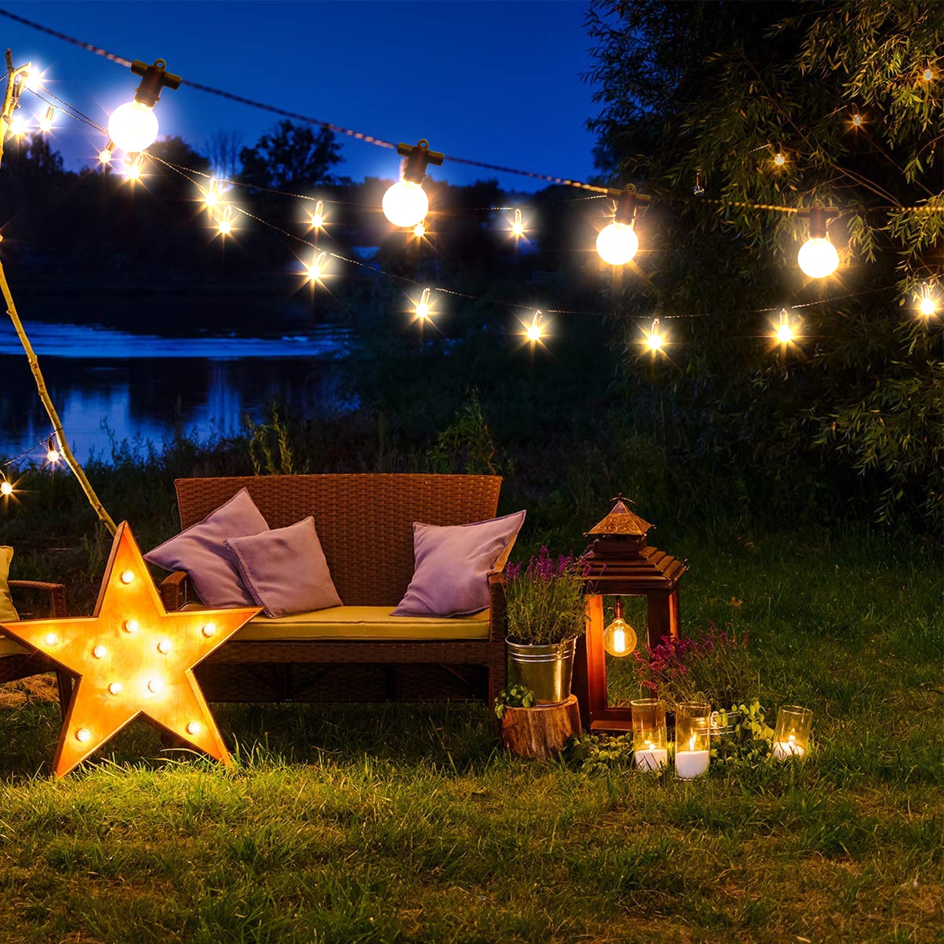 15m LED patio string lights illuminating outdoor seating area with star-shaped light and lantern at night
